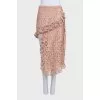 Lace suit with an asymmetrical skirt