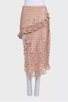 Lace suit with an asymmetrical skirt