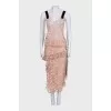 Lace suit with an asymmetrical skirt