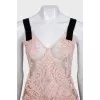 Lace suit with an asymmetrical skirt