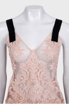 Lace suit with an asymmetrical skirt