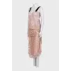 Lace suit with an asymmetrical skirt