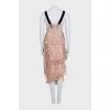 Lace suit with an asymmetrical skirt
