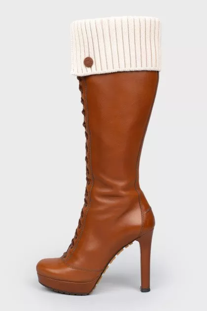 Brown leather boots on lacing