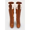 Brown leather boots on lacing