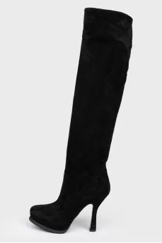 Black suede boots with stiletto heels