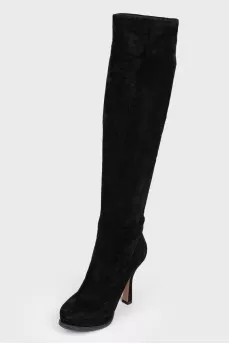Black suede boots with stiletto heels