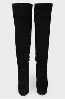 Black suede boots with stiletto heels