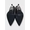Black leather mules with metal insert