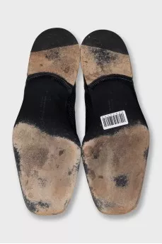 Men's black leather shoes with perforations