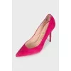 Pink suede pumps