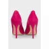 Pink suede pumps
