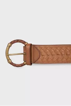 Leather belt with a braided element