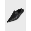 Black leather pointed-toe shoes