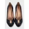 Black patent leather open-toe shoes