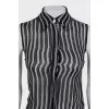 Black and white silk sleeveless blouse