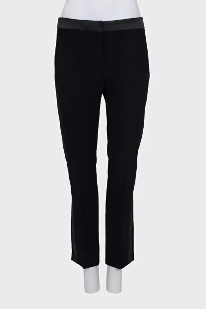 Black trousers with satin inserts on the sides