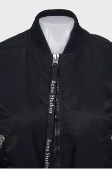 Black bomber jacket with a zipper