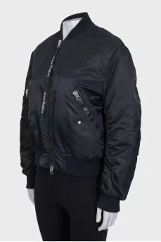 Black bomber jacket with a zipper