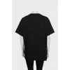 Black loose-fitting t-shirt with signature print