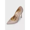 Golden shoes decorated with glitter