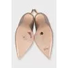 Golden shoes decorated with glitter