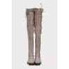 Gray suede over-the-knee boots with lace-up closures