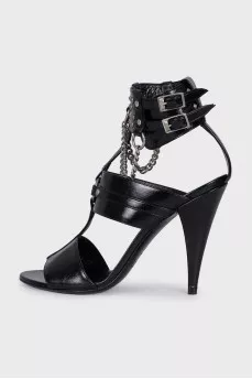 Black leather sandals decorated with studs