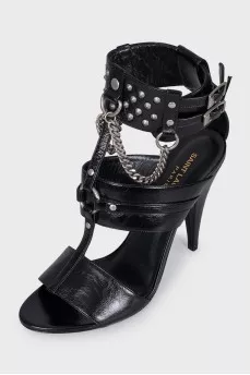 Black leather sandals decorated with studs