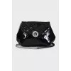 Quilted patent leather bag with chain