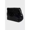 Quilted patent leather bag with chain