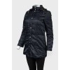 Dark blue jacket with golden buttons