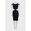 A fitted dress with side cutouts