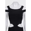A fitted dress with side cutouts