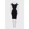 A fitted dress with side cutouts