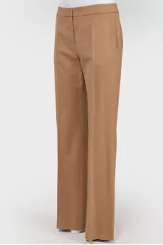 Brown trousers of straight cut from a camel wool