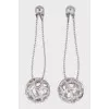 Silver earrings decorated with crystals
