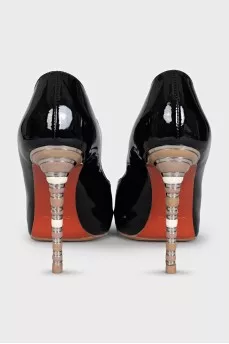 Black shoes with decorated heels