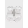 Patent leather sandals with velcro fastenings