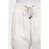 Beige sweatpants with pockets