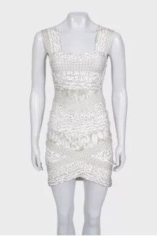 Cocktail dress with cutout waist and tag