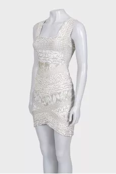 Cocktail dress with cutout waist and tag