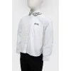 Children's white shirt with black embroidery