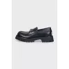 Leather loafers with embellishments