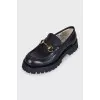 Leather loafers with embellishments