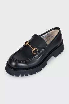Leather loafers with embellishments