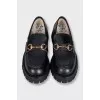 Leather loafers with embellishments