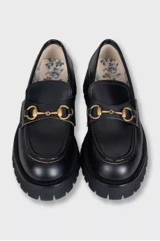 Leather loafers with embellishments