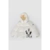 Creamy children's jacket with black pattern