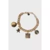 Gold chain bracelet with pendants